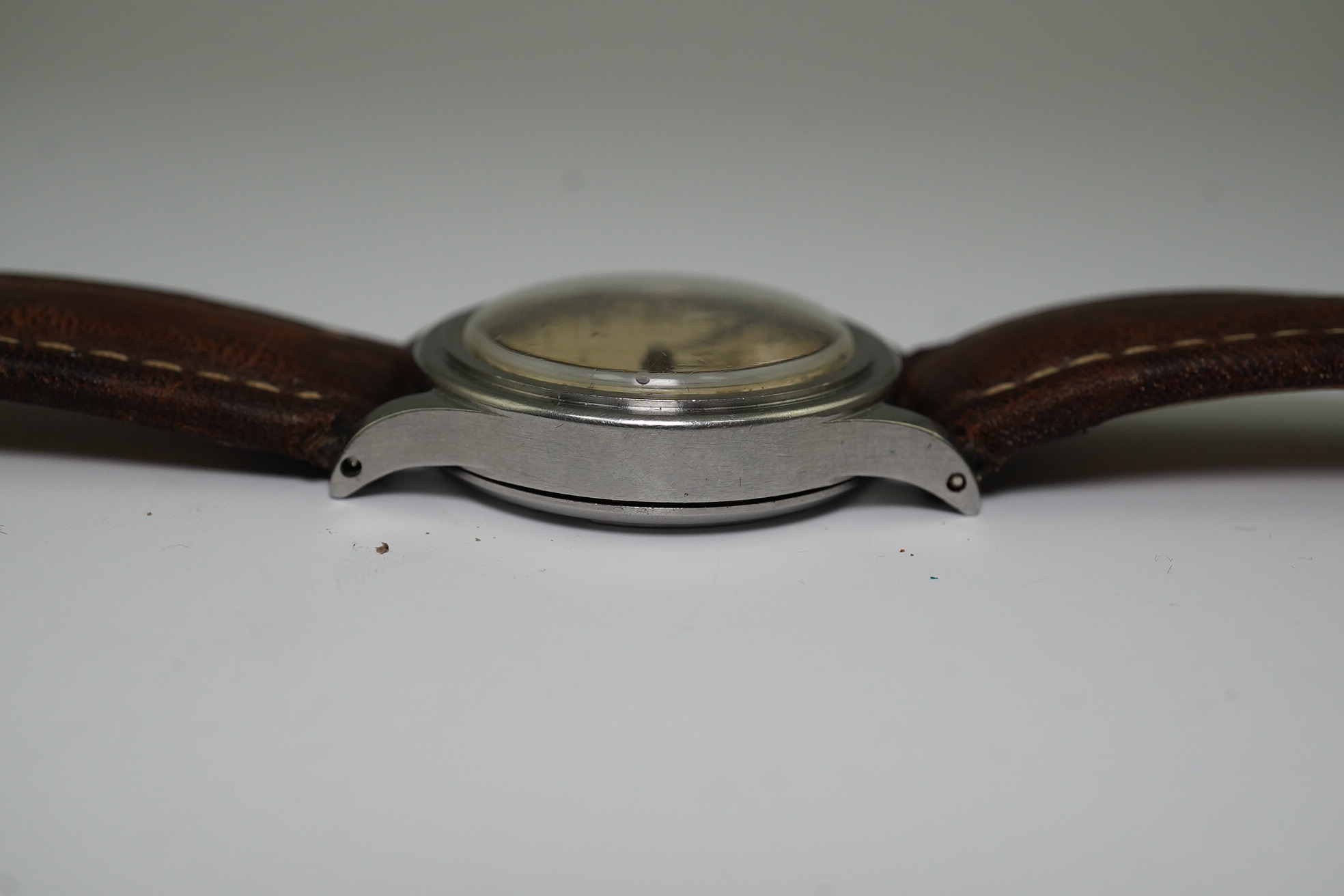 A gentleman's mid 1940's steel Longines military manual wind wrist watch